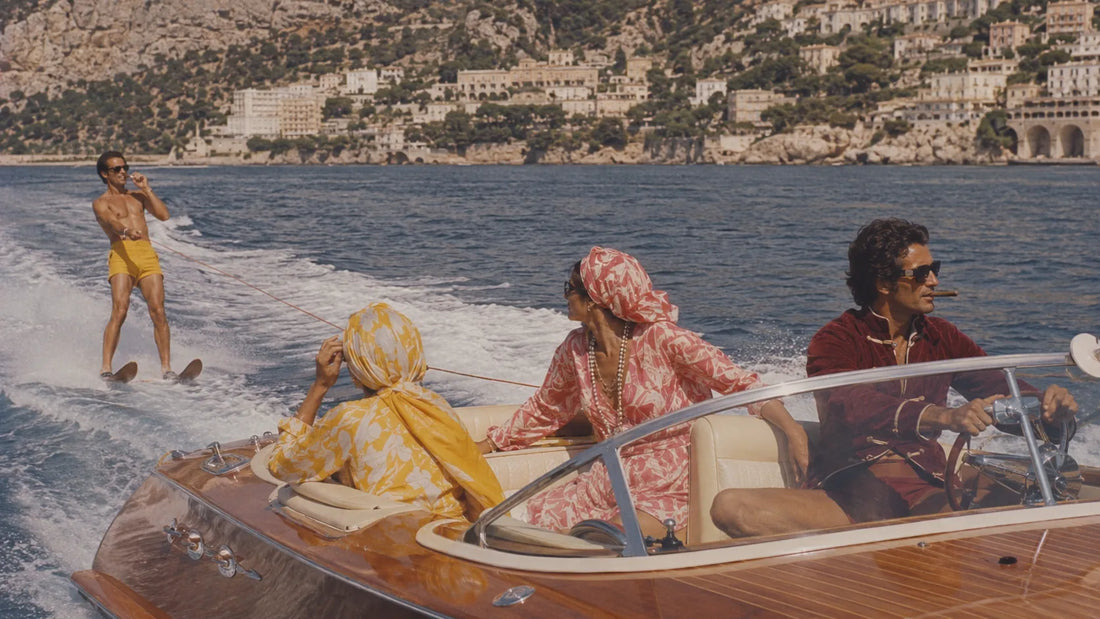 Riviera packing guide: water skier off Cap d'Antibes with the French Riviera coastline